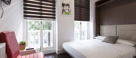 Comfort Room, 1 Double Bed, Private Bathroom | Individually furnished, desk, laptop workspace, blackout drapes