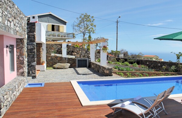 Outdoor pool, pool umbrellas, pool loungers