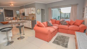 Deluxe Cottage, 1 Bedroom | Living area - Bothasig Holiday Rentals (Cape Town)