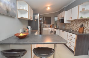 Deluxe Cottage, 1 Bedroom | Private kitchen | Fridge, espresso maker, cookware/dishes/utensils - Bothasig Holiday Rentals (Cape Town)
