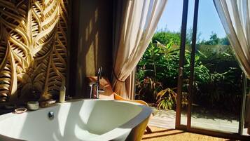 Shower, bathrobes, slippers, towels