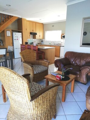 Comfort Cottage, 4 Bedrooms | Private kitchen | Full-size fridge, microwave, oven, stovetop