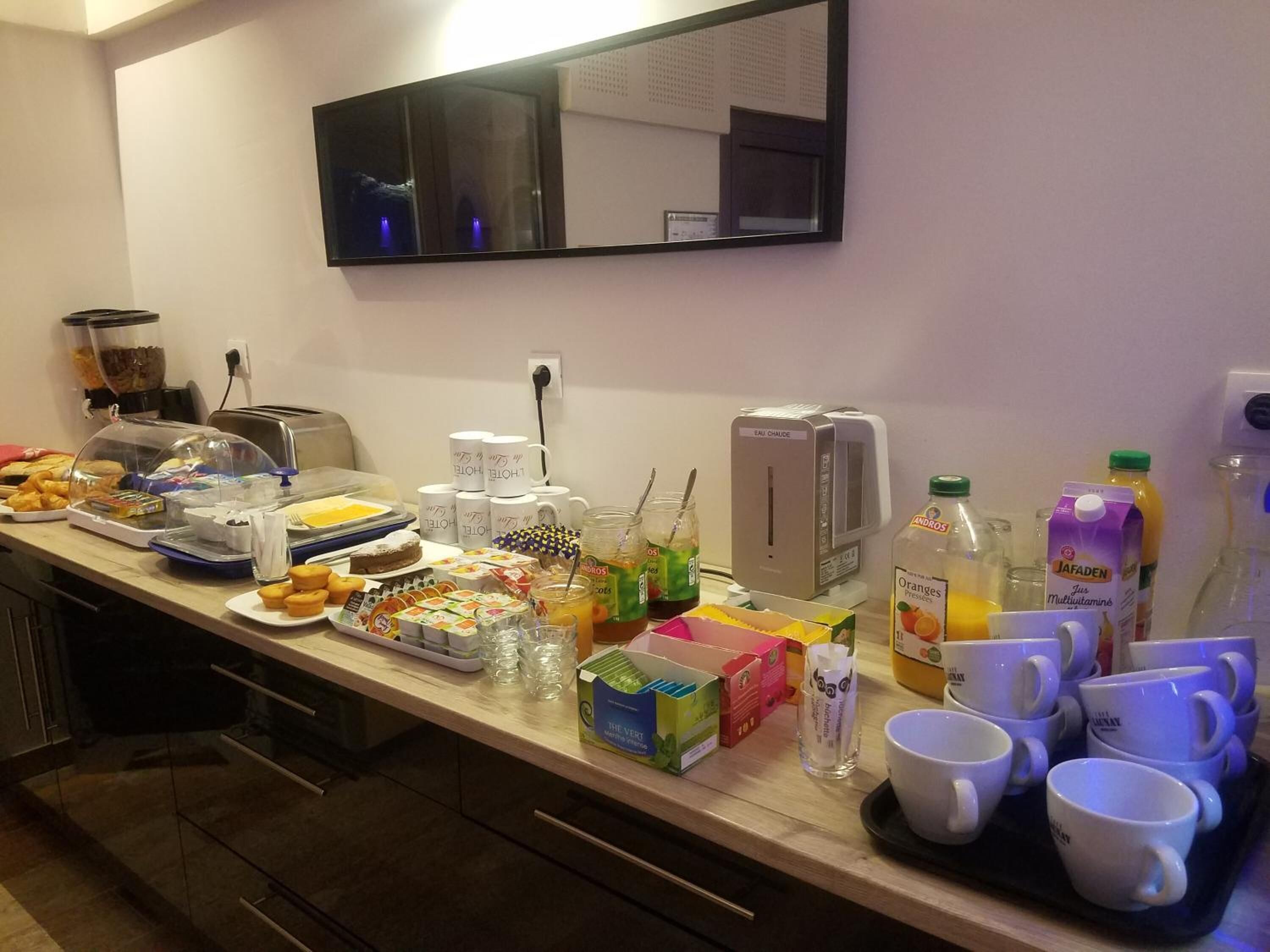 breakfast, lunch served; local and international cuisine, garden views