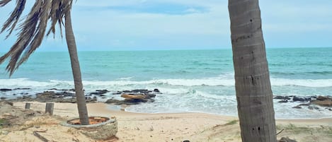 On the beach, white sand