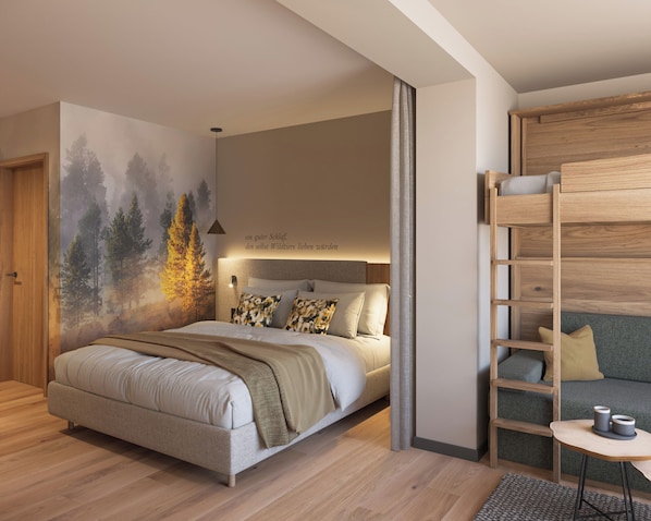A bedroom with a bed, a wall mural, a wooden ladder, and a small table with candles. - Hotel Ziach & Candy (Grossarl)