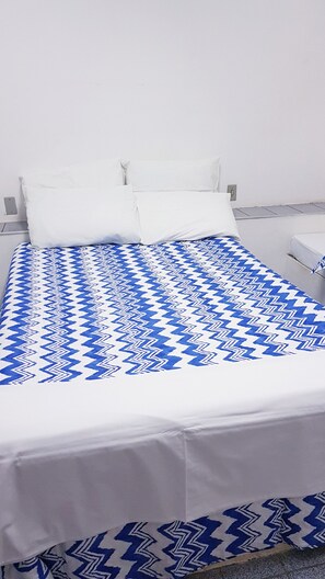 Blackout curtains, iron/ironing board, free WiFi, bed sheets