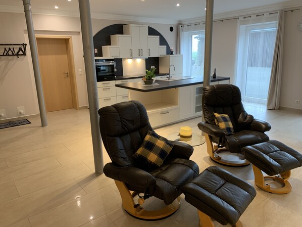 Comfort Suite, 2 Queen Beds, Non Smoking, Courtyard View | Living area | 55-inch flat-screen TV with satellite channels, TV, iPod dock - Apartment Ahsbahs Suite near Airport (Elskop)