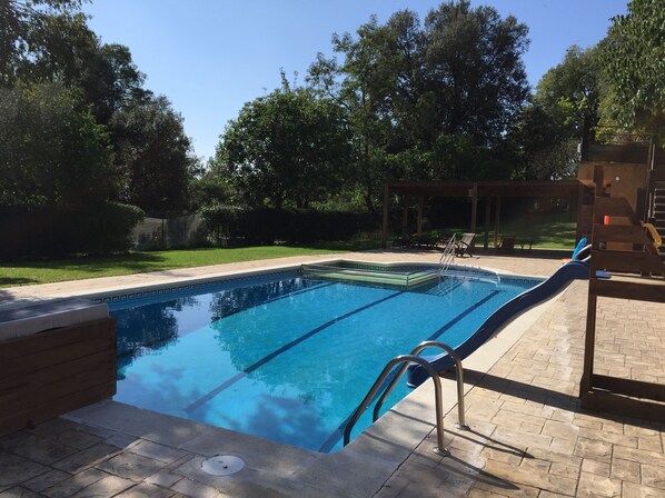 Indoor pool, outdoor pool, pool umbrellas, pool loungers