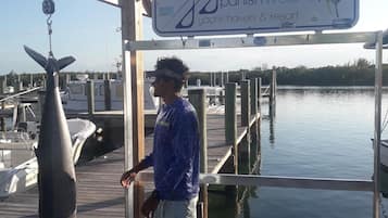 A dock with a sign for PanishWells Yacht Haven & Resort.