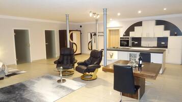 55-inch flat-screen TV with satellite channels, TV, iPod dock