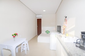 Mini-fridge, microwave, coffee/tea maker, electric kettle