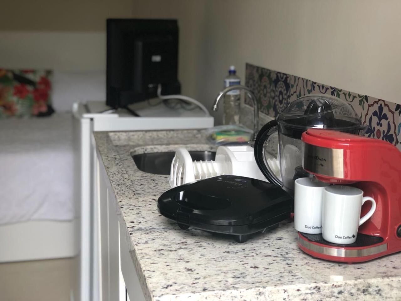 mini-fridge, microwave, coffee/tea maker, electric kettle