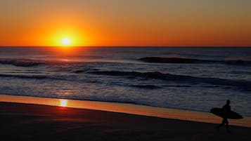 Beach nearby, white sand, sun loungers, beach umbrellas