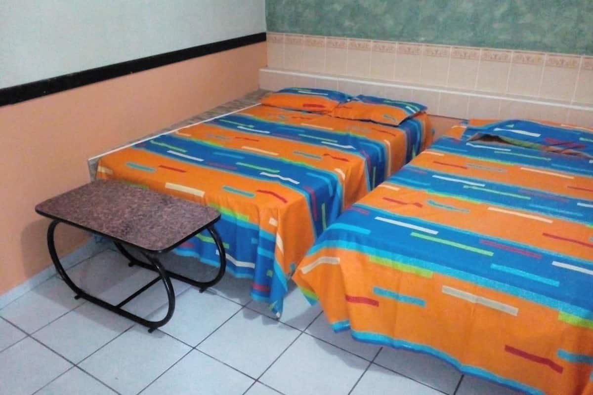 Kamar Keluarga, Beberapa Tempat Tidur, akses difabel, kamar mandi pribadi | Seprai premium, meja kerja, Wi-Fi gratis, dan seprai linen