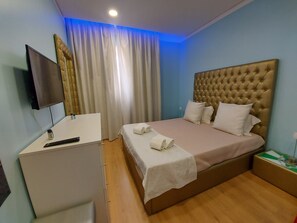 Suíte família, 3 quartos, vista para a cidade | Frigobar, cortinas blackout, quartos à prova de som, Wi-Fi de cortesia