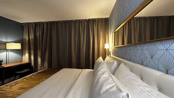 1 bedroom, premium bedding, down comforters, individually decorated