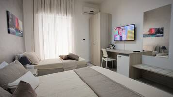 Departamento Deluxe, 1 habitación | Sábanas italianas Frette, ropa de cama de alta calidad y edredón