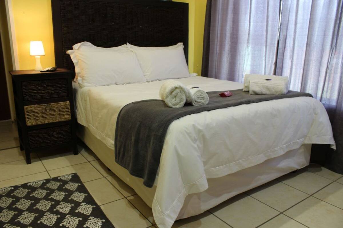Blackout drapes, iron/ironing board, free WiFi, bed sheets