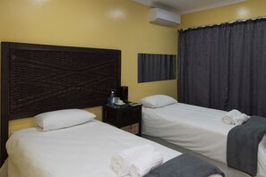 Blackout drapes, iron/ironing board, free WiFi, bed sheets