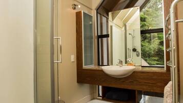 Bathtub, hair dryer, towels, soap