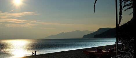 Sun-loungers, beach towels