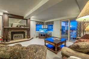 Flat-screen TV, fireplace