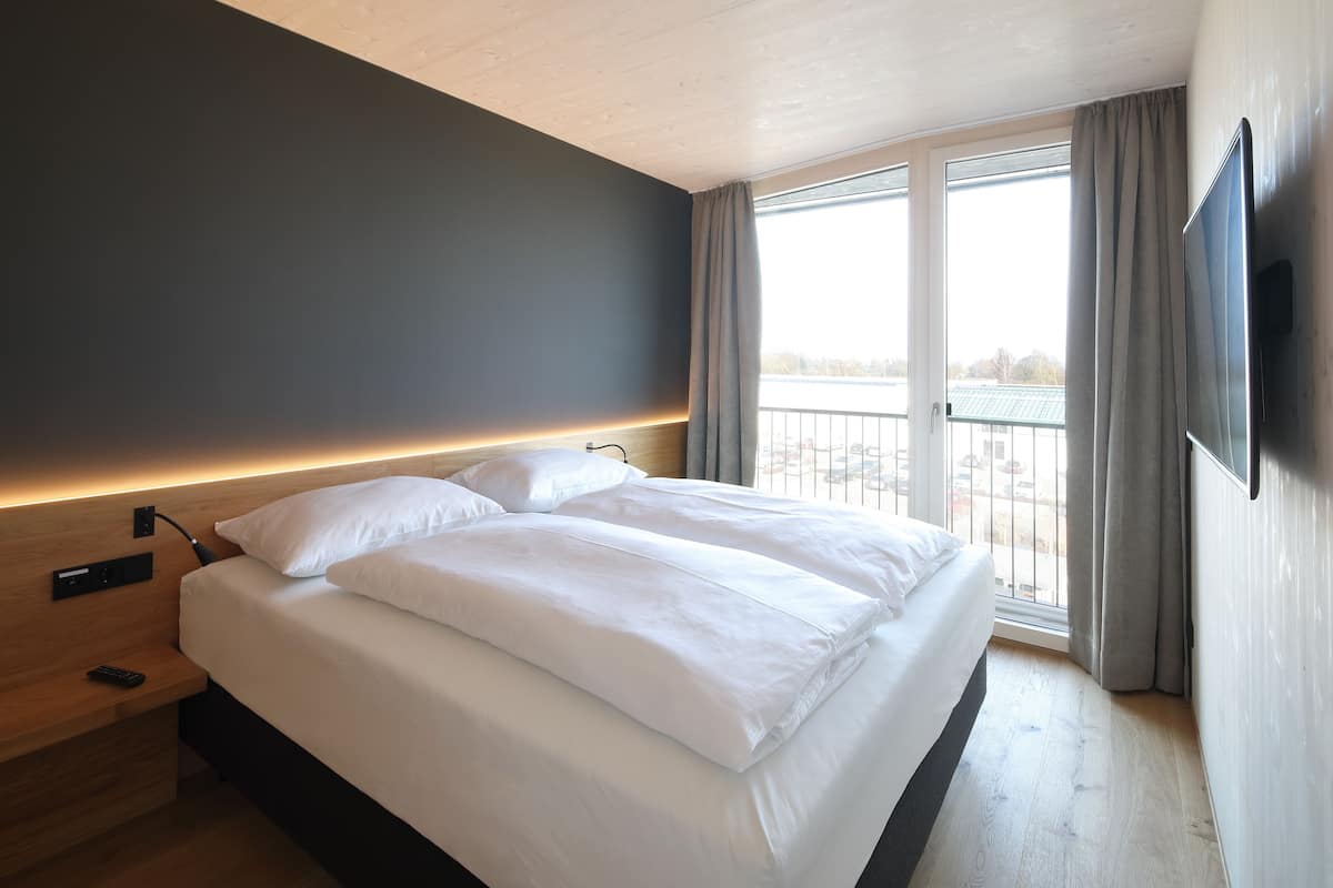 junior suite | in-room safe, desk, soundproofing, rollaway beds