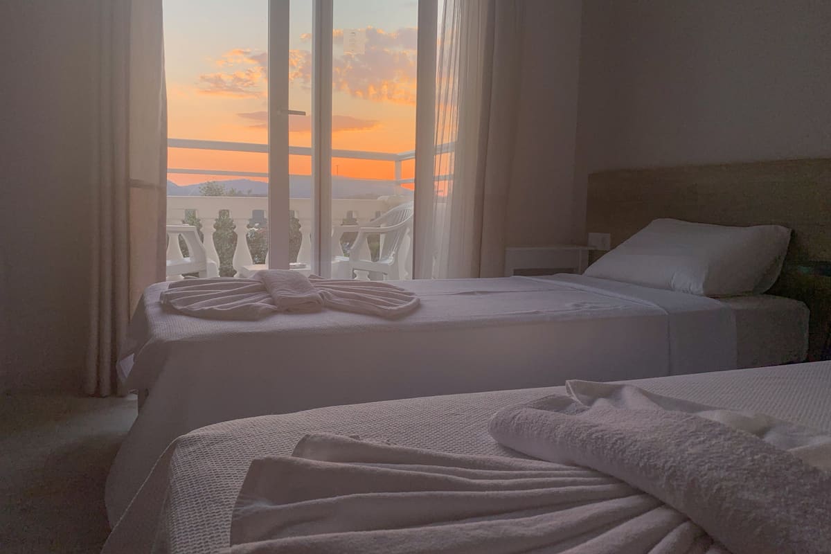 comfort twin room, balcony | in-room safe, blackout curtains, soundproofing, free wifi