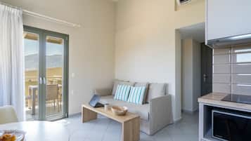 Executive Villa, 1 Bedroom, Sea View (#7) | Living area | 30-inch flat-screen TV with satellite channels, TV