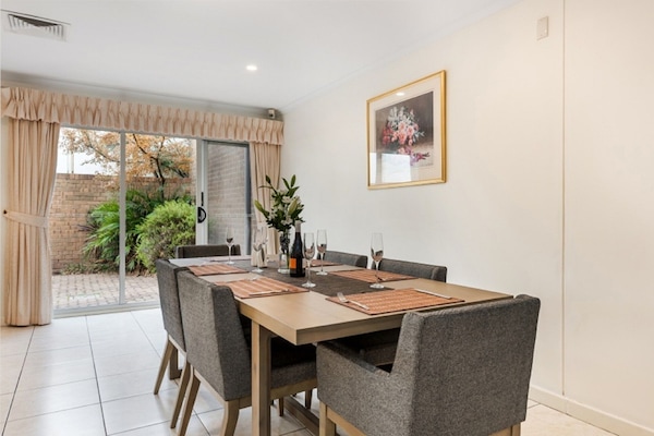 Spend quality meal times in this dining room located next to the kitchen.