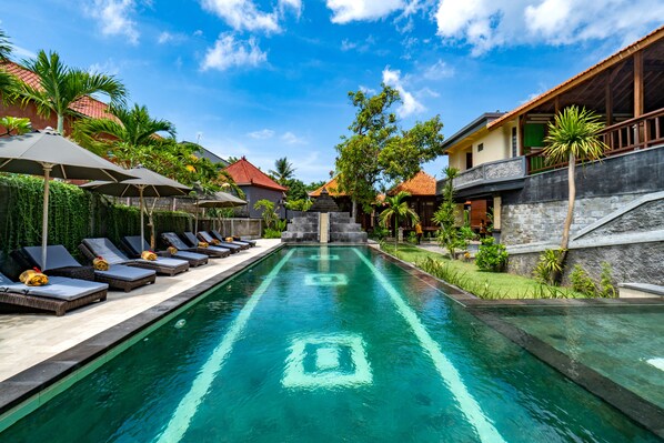 Outdoor pool, pool umbrellas, pool loungers