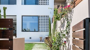 A modern building with a staircase leading to a garden area. - Fos Villa your place under the Cretan Sun with private heated pool (Chania)
