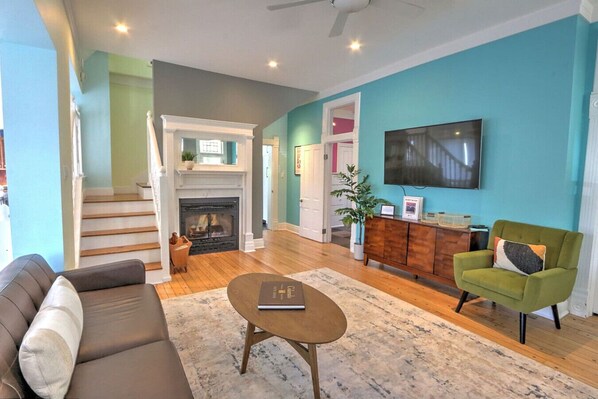 TV, fireplace, books