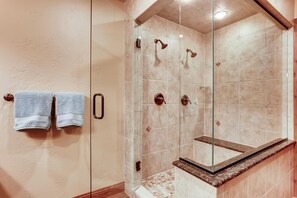 Combined shower/bathtub, hair dryer, towels, soap