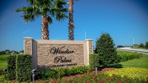 A sign for Windor Palms, a gated resort community. - Windsor Palms Villa w/South Facing Private Pool & Hot Tub Close to Disney & Golf (Kissimmee)