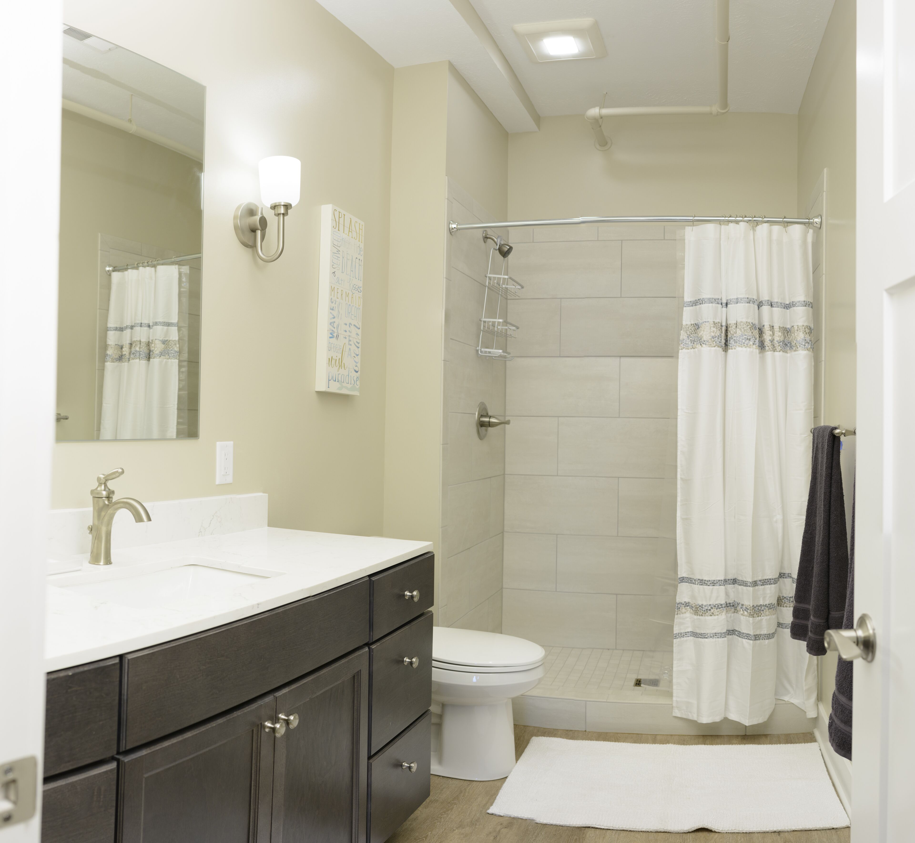 Combined shower/tub, hair dryer, towels, soap