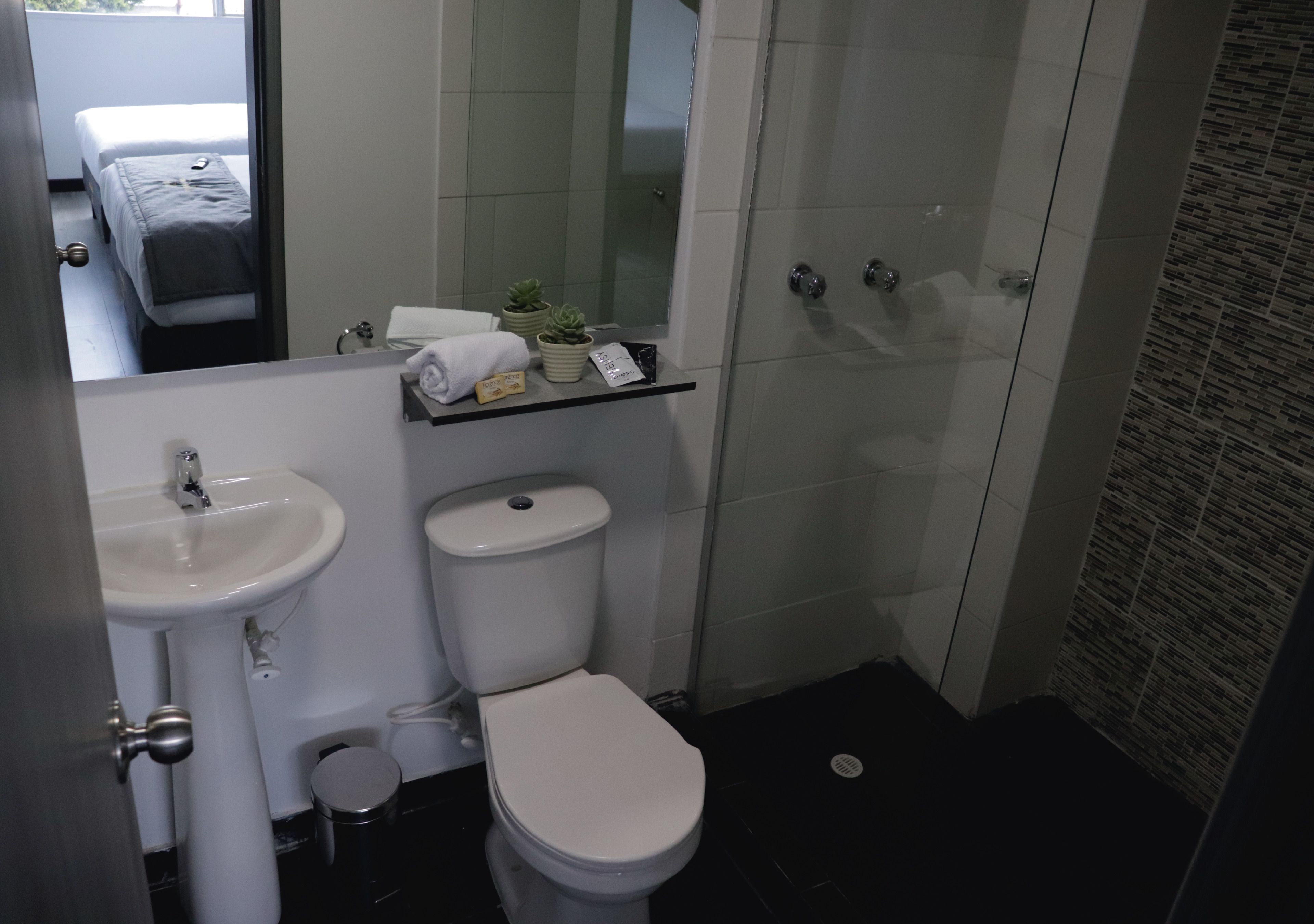 family room, private bathroom | bathroom | shower, free toiletries, towels