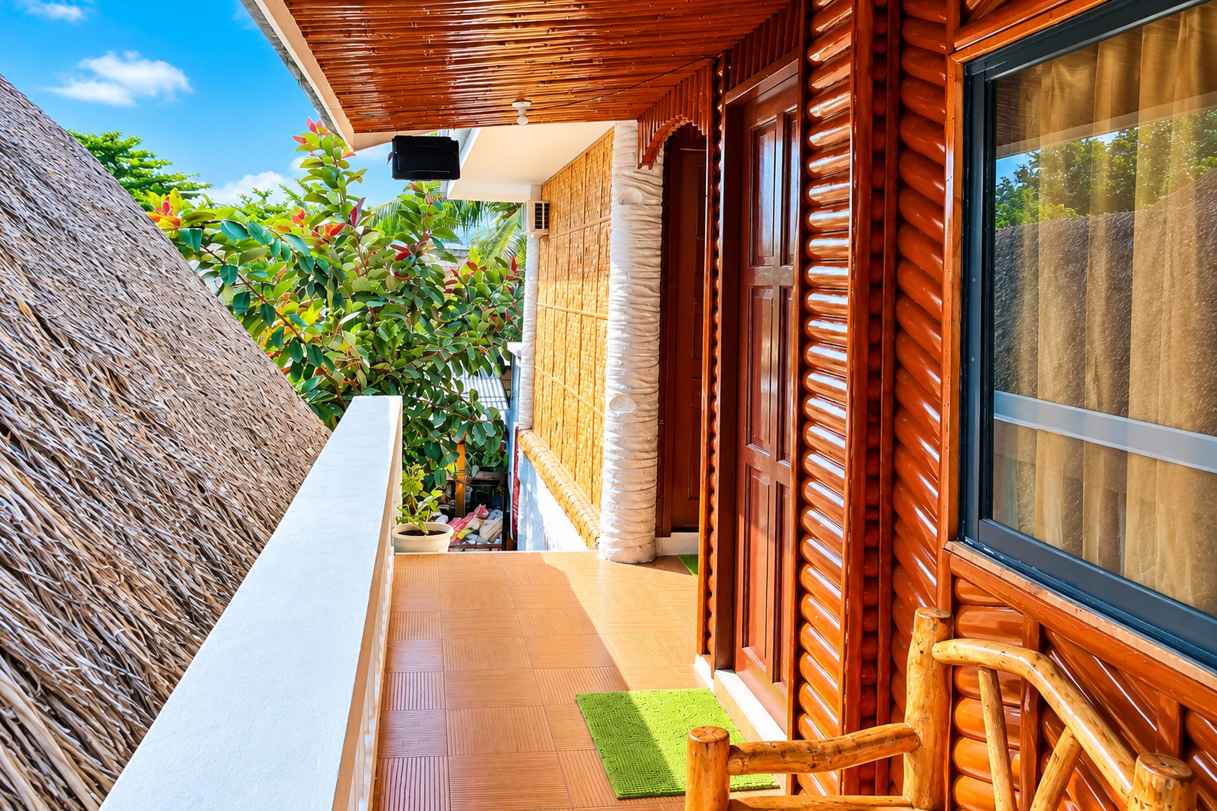 A wooden exterior with a balcony, a window, and a door.