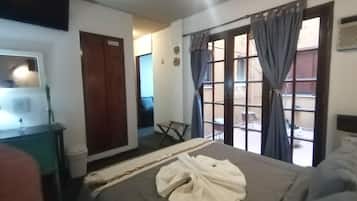 Standard Quadruple Room | Down comforters, minibar, in-room safe, desk