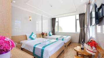 Habitación triple | Minibar, escritorio, insonorización y wifi gratis