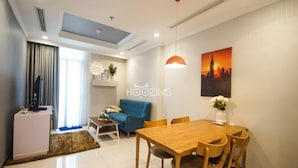 Apartment, 1 Bedroom | Living area | Flat-screen TV - The Nice Arrival (Ho Chi Minh City)