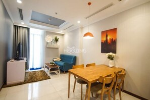 Apartment, 1 Bedroom | Living area | Flat-screen TV - The Nice Arrival (Ho Chi Minh City)