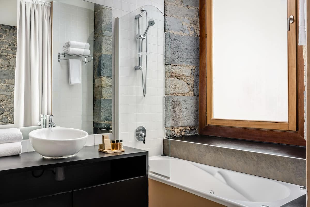 superior double room | bathroom | free toiletries, hair dryer, towels