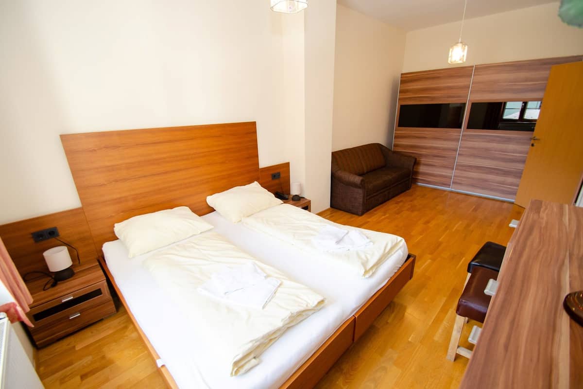 Een kluis op de kamer, gratis wifi, beddengoed