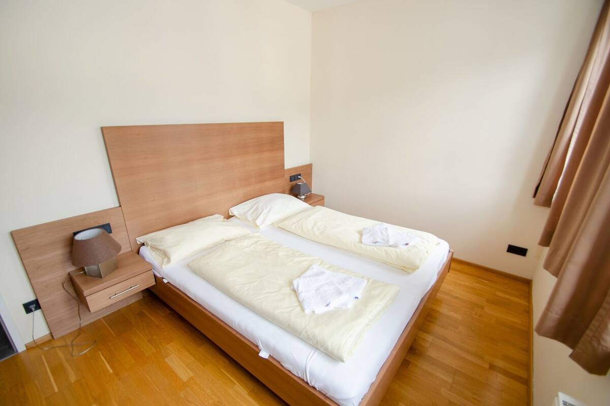 Aparthotel Post 5C | Een kluis op de kamer, gratis wifi, beddengoed