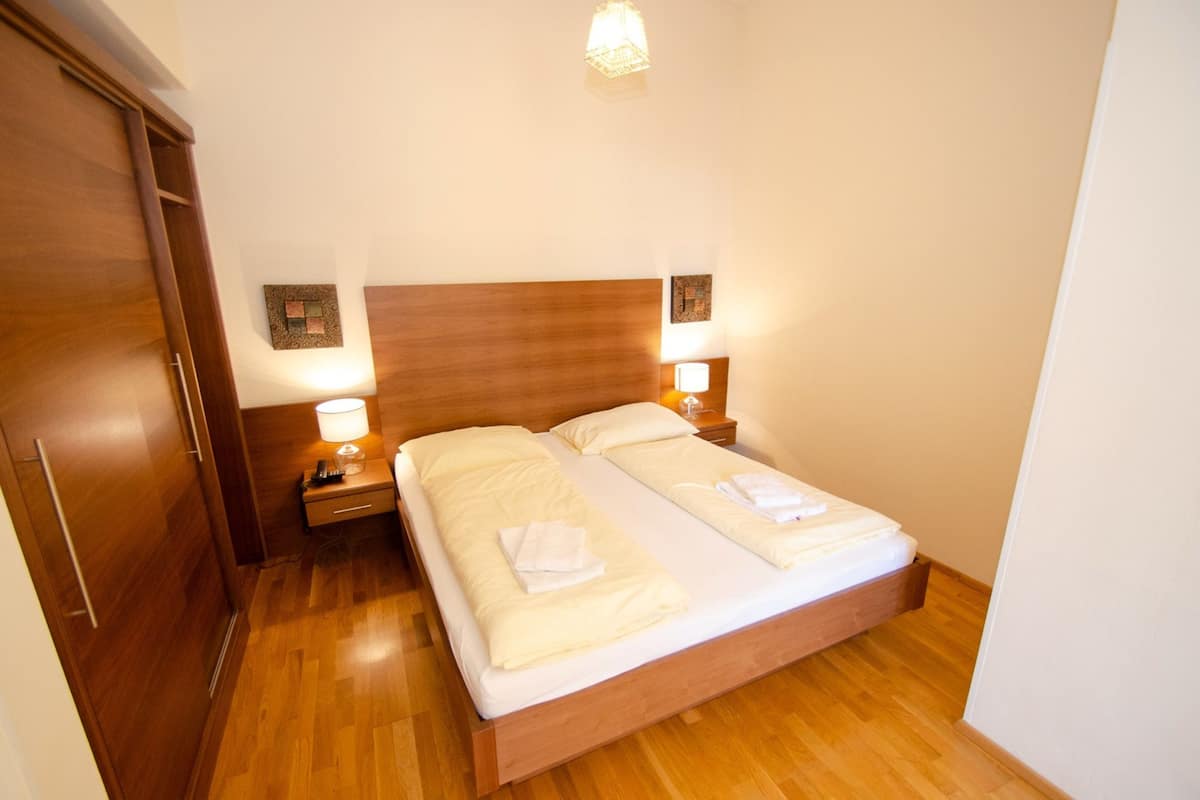 Aparthotel Post 4B | Een kluis op de kamer, gratis wifi, beddengoed