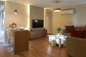 Appartement Deluxe, 2 chambres | Coin séjour