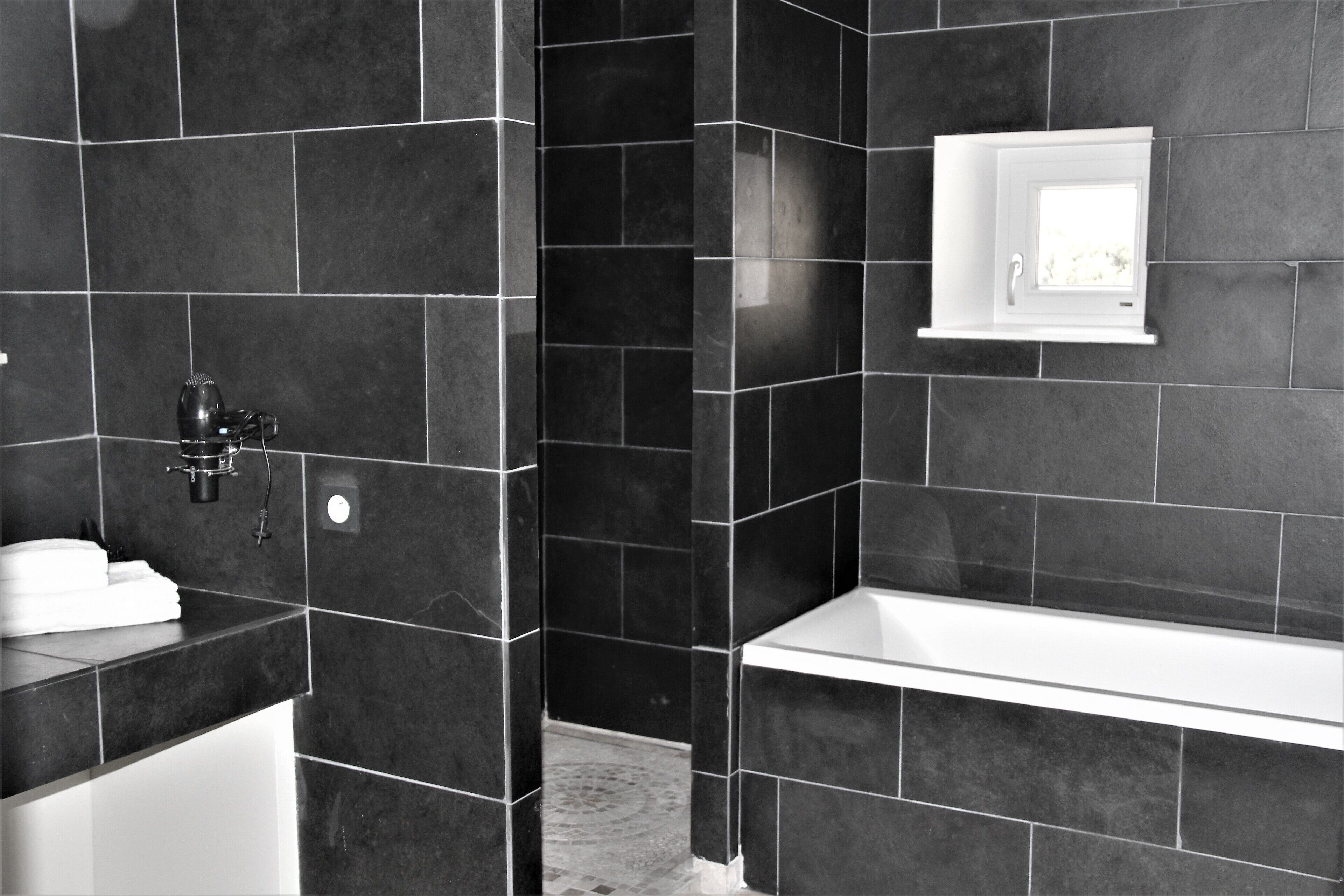 panoramic suite | bathroom | separate bathtub and shower, rainfall showerhead, free toiletries