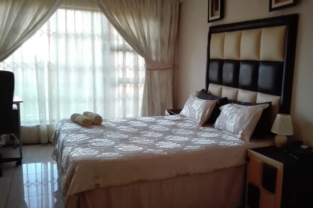 Basic Double Room, 1 Double Bed, Garden View | 1 bedroom, desk, iron/ironing board, free WiFi