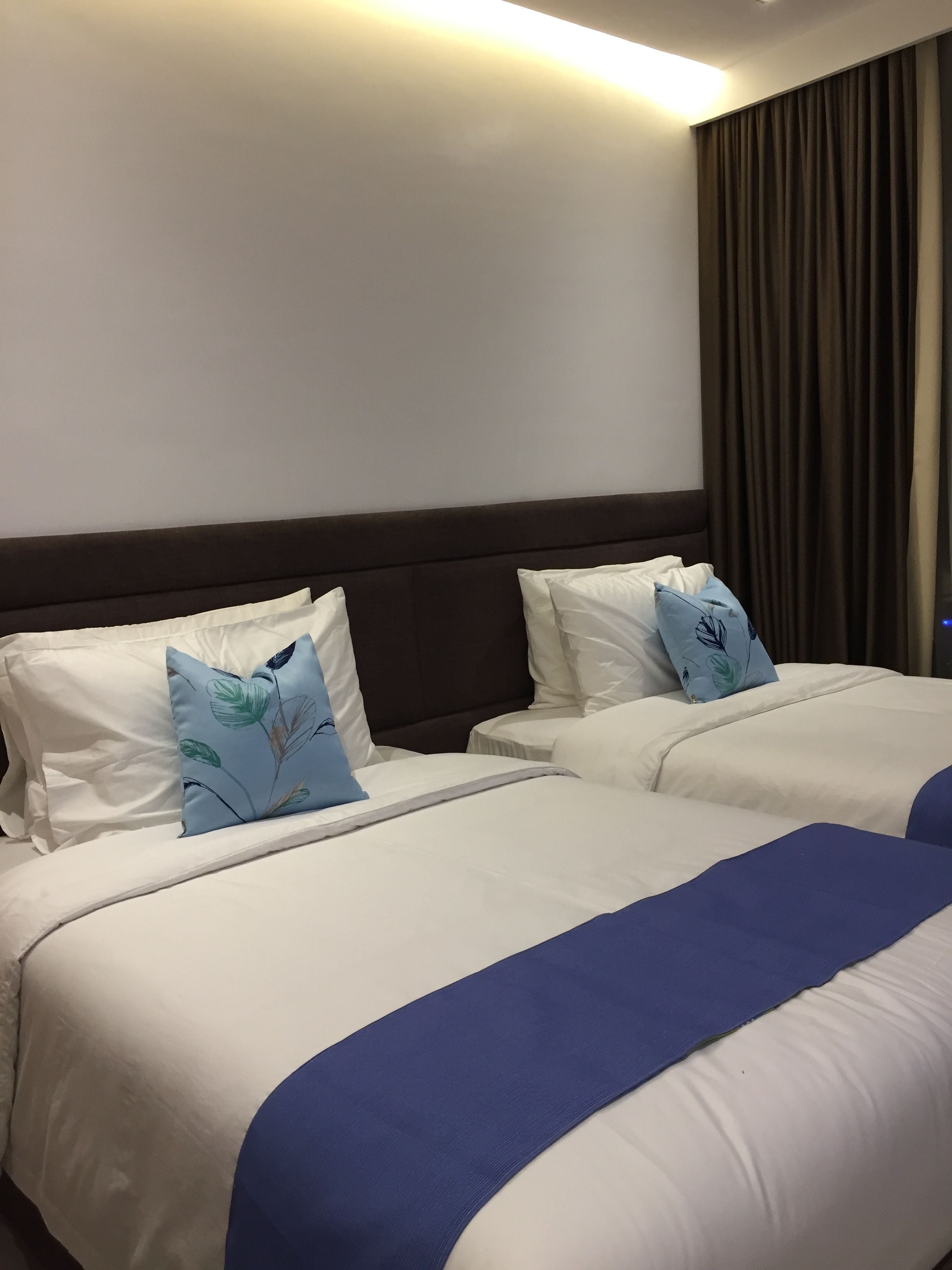 deluxe room | in-room safe, desk, iron/ironing board, rollaway beds